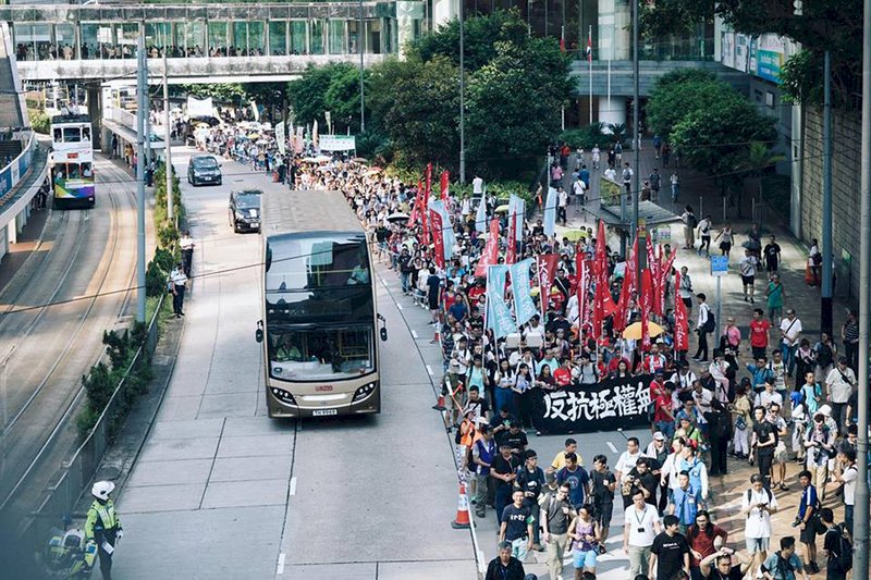 香港團體遊行聲援黃之鋒等被囚人士