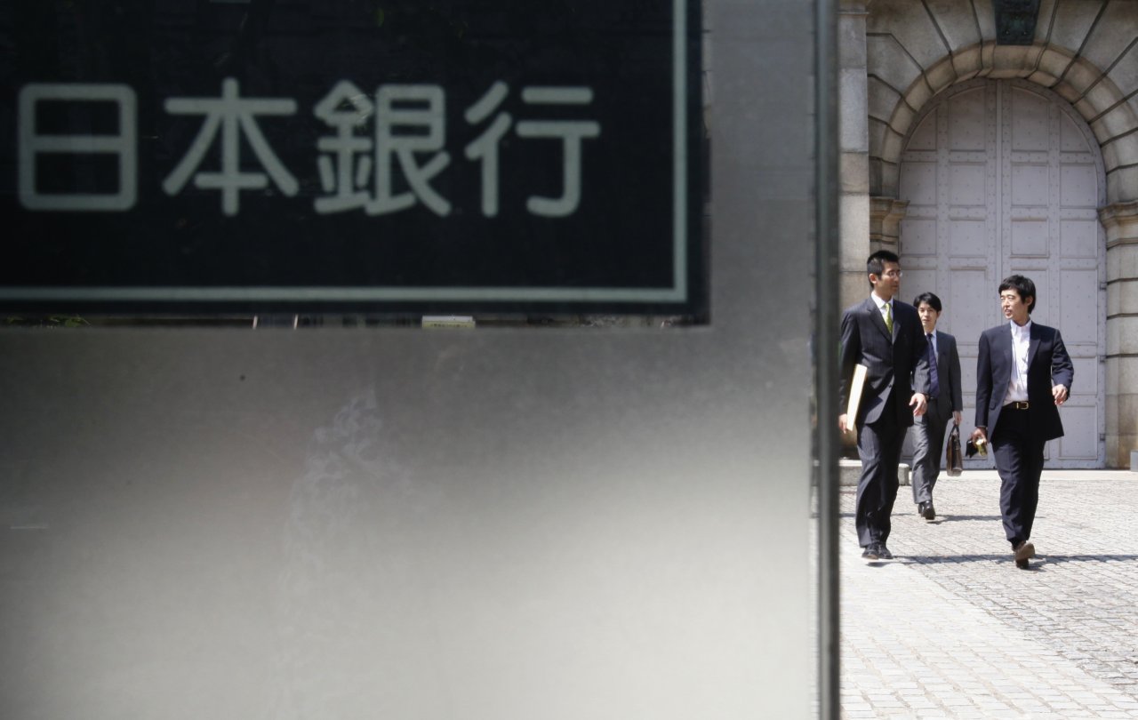 日本央行堅持寬鬆 上調通膨預測