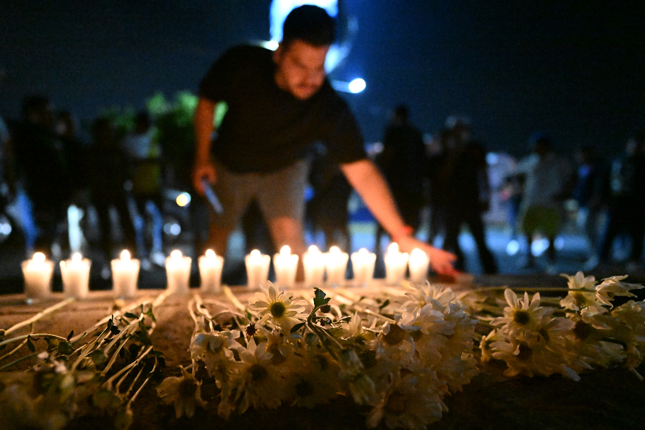 薩爾瓦多球迷悼念踩踏事故罹難者 總統矢言徹查